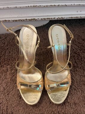 Casadei Metallic Gold Bow Slingback Heels